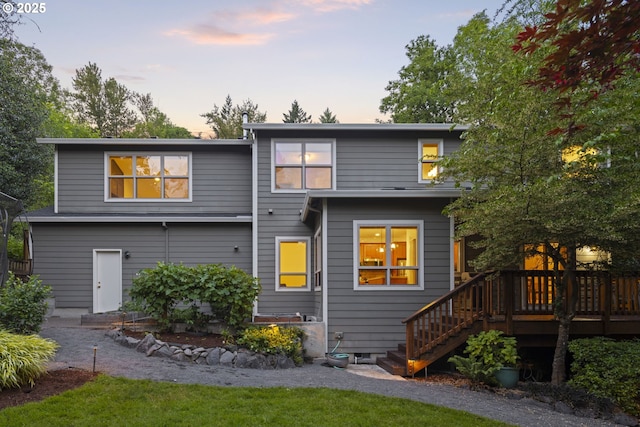 3946 SW Coronado St, Portland, OR 97219 - back of property with a wooden deck and stairs