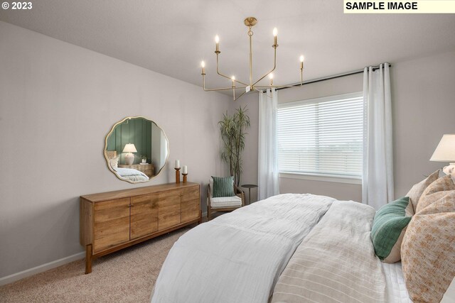 2484 SE Teal Ave, Gresham, OR 97080 - carpeted bedroom with a chandelier and baseboards