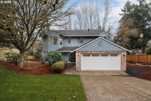 view of front property featuring a garage and a front yard