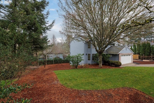 view of yard with a garage