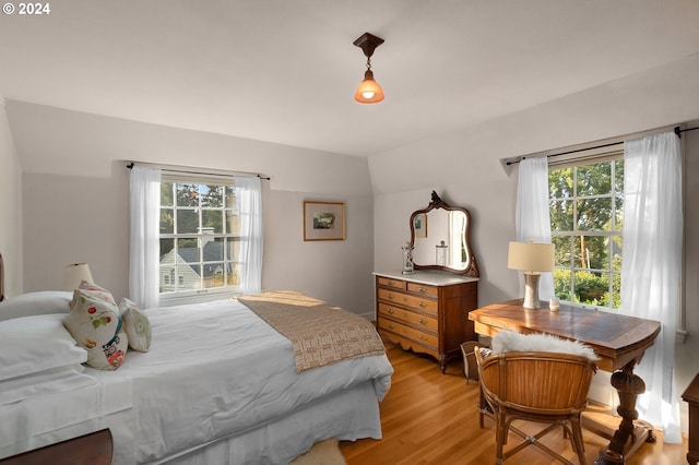 bedroom with light wood-style floors