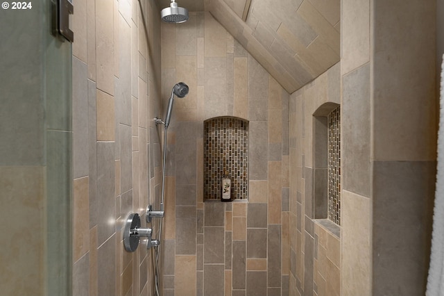 detailed view of tiled shower and arched walkways