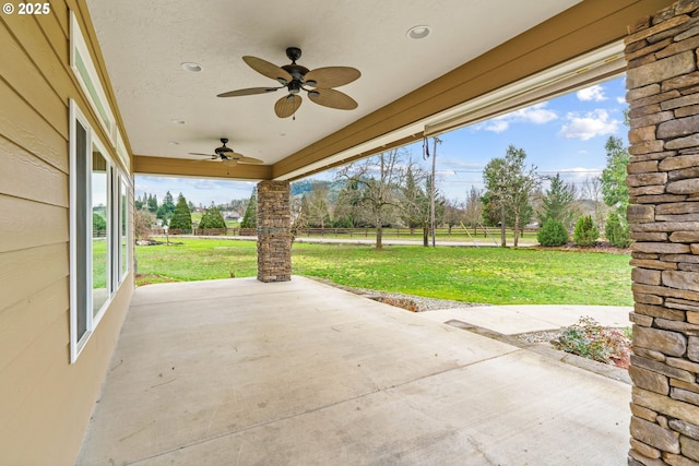 view of patio / terrace featuring a ceiling fan