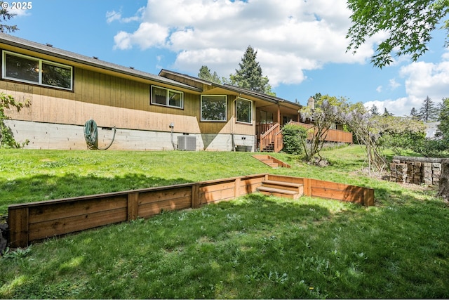 view of yard featuring central AC