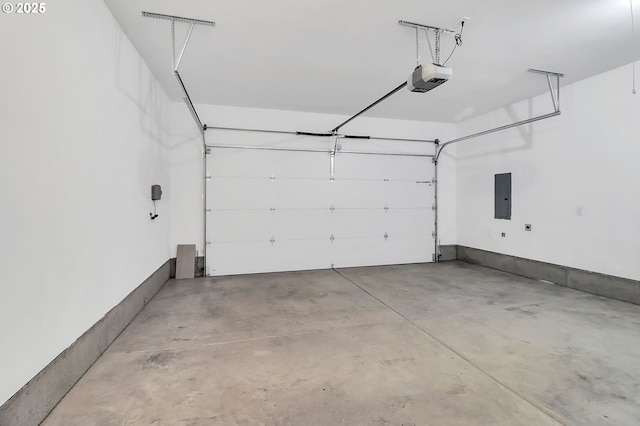 garage featuring electric panel and a garage door opener