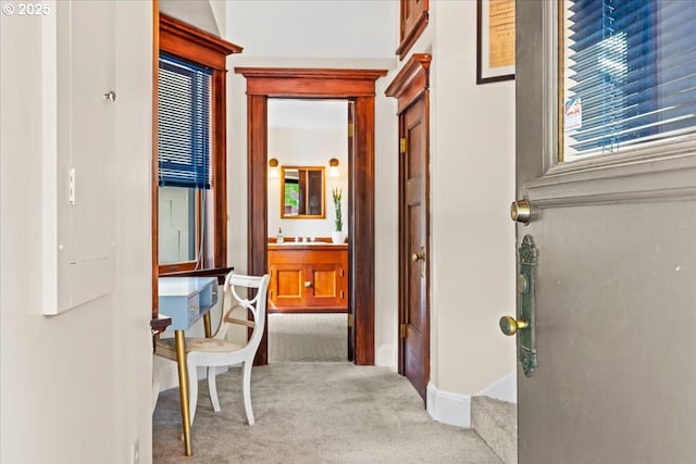 1111 NW 25th Ave Unit 1, Portland, OR 97210 - corridor with carpet floors, baseboards, and a sink