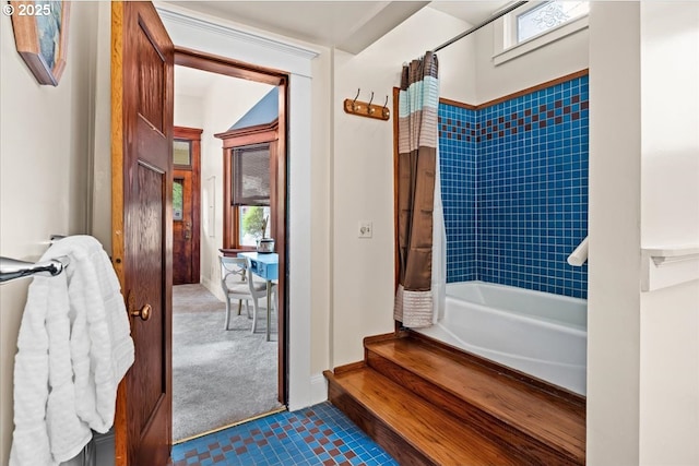 1111 NW 25th Ave Unit 1, Portland, OR 97210 - bathroom with tile patterned flooring and shower / tub combo with curtain