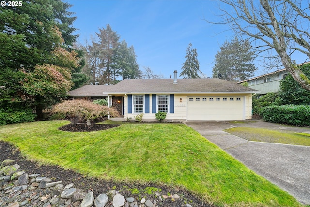 view of front facade featuring a garage and a front lawn