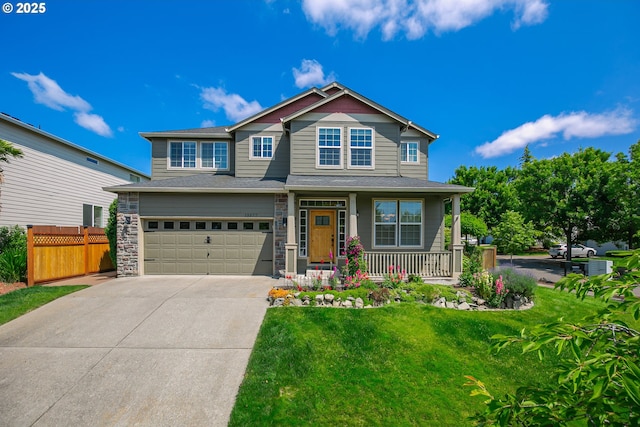 13577 SE Kisor Ct, Happy Valley, OR 97086 - craftsman house with a porch, an attached garage, concrete driveway, and stone siding