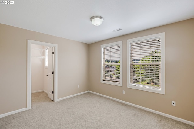 13577 SE Kisor Ct, Happy Valley, OR 97086 - unfurnished room featuring light carpet and baseboards