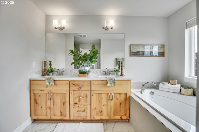 3985 SE Lostine Ln, Hillsboro, OR 97123 - full bath with marble look tiles, double vanity, and a garden tub