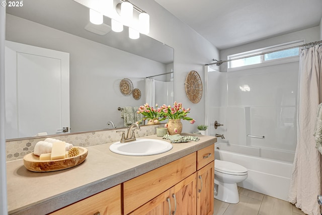 3985 SE Lostine Ln, Hillsboro, OR 97123 - bathroom with vanity, shower / tub combo, and toilet