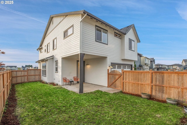 3985 SE Lostine Ln, Hillsboro, OR 97123 - rear view of property with a patio area, a gate, a residential view, and a garage