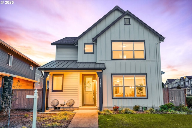 3985 SE Lostine Ln, Hillsboro, OR 97123 - view of front of home with a standing seam roof, board and batten siding, and metal roof