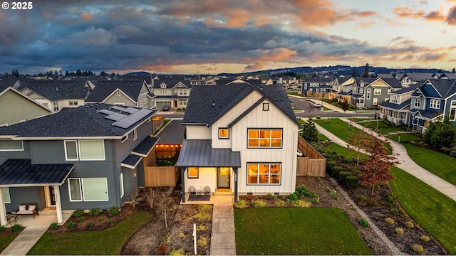 3985 SE Lostine Ln, Hillsboro, OR 97123 - view of front of home with a residential view, board and batten siding, and covered porch