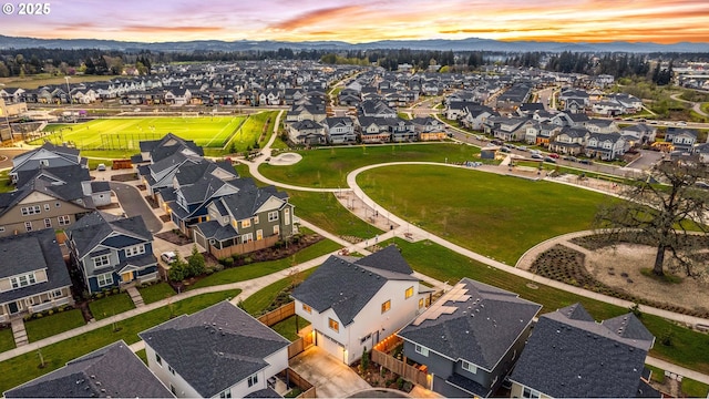 3985 SE Lostine Ln, Hillsboro, OR 97123 - aerial perspective of suburban area featuring a mountainous background