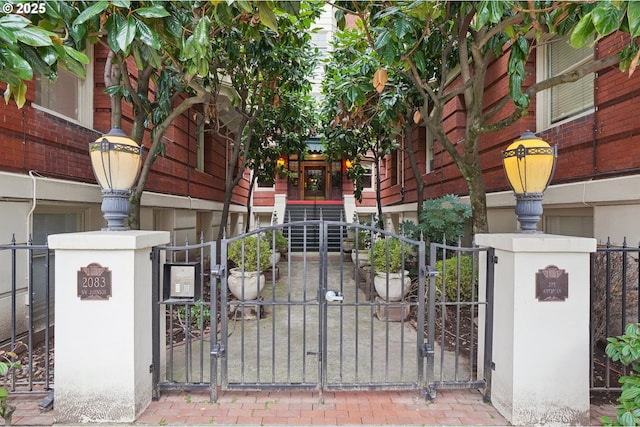 view of gate featuring fence
