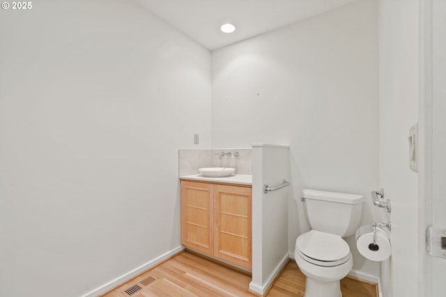 62 Condolea Ter, Lake Oswego, OR 97035 - bathroom with wood finished floors and vanity