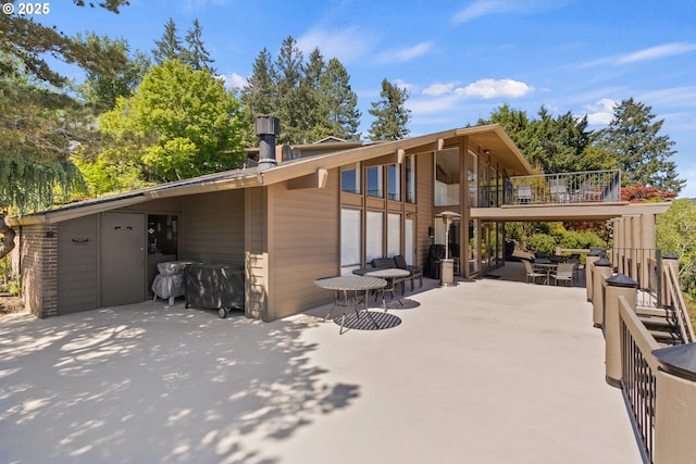 rear view of house with a patio