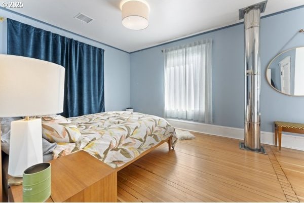 1508 Union Ave, North Bend, OR 97459 - bedroom with baseboards and wood finished floors