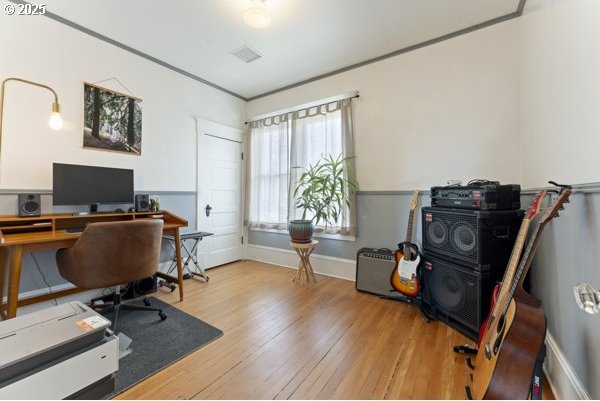 1508 Union Ave, North Bend, OR 97459 - office area featuring wood finished floors and baseboards