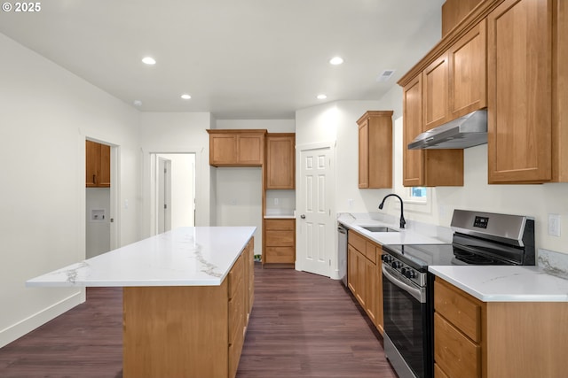 48438 E Meadow Way, Oakridge, OR 97463 - kitchen featuring stainless steel appliances, under cabinet range hood, dark wood-type flooring, a kitchen island, and recessed lighting