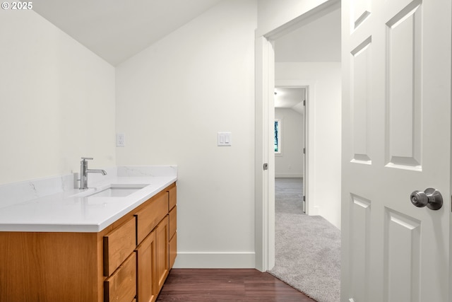 48438 E Meadow Way, Oakridge, OR 97463 - bathroom featuring vanity, vaulted ceiling, and wood finished floors