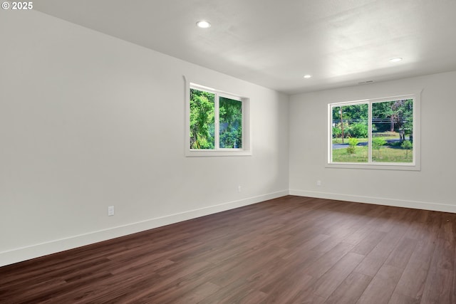 48438 E Meadow Way, Oakridge, OR 97463 - spare room featuring dark wood-style floors and recessed lighting