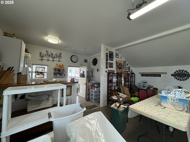 dining area with lofted ceiling