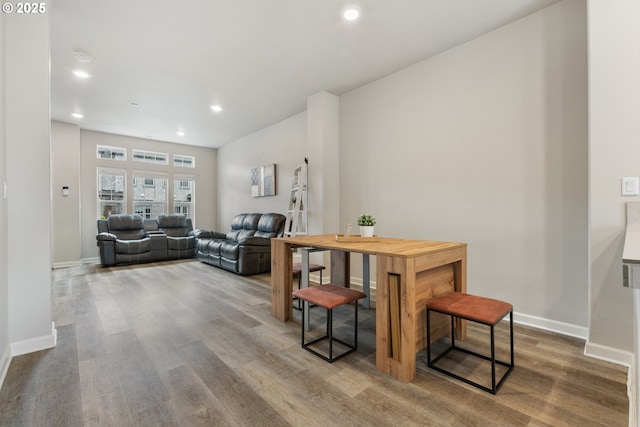 11449 SW Mont Blanc St, Wilsonville, OR 97070 - dining room with wood finished floors, baseboards, and recessed lighting