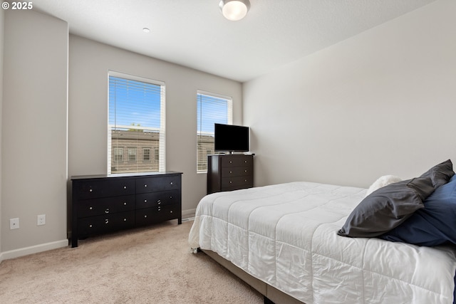 11449 SW Mont Blanc St, Wilsonville, OR 97070 - bedroom with baseboards and light colored carpet