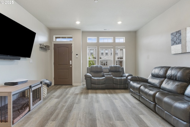 11449 SW Mont Blanc St, Wilsonville, OR 97070 - living area featuring light wood-style floors, recessed lighting, and baseboards