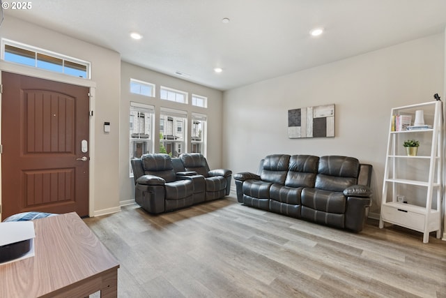 11449 SW Mont Blanc St, Wilsonville, OR 97070 - living area with light wood finished floors, recessed lighting, and baseboards