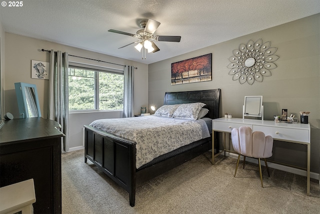 bedroom with baseboards, light carpet, and a ceiling fan