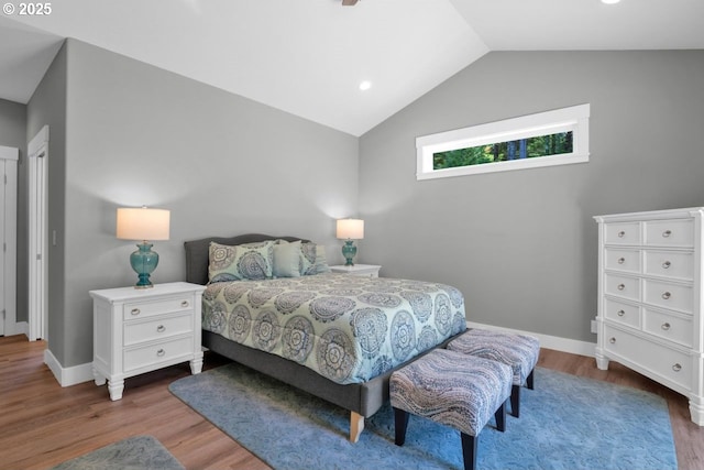 83591 Sauter Dr, Florence, OR 97439 - bedroom featuring wood finished floors, lofted ceiling, and recessed lighting