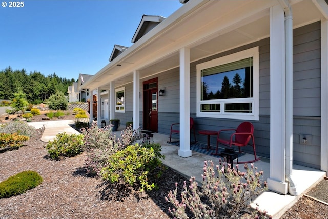 83591 Sauter Dr, Florence, OR 97439 - property entrance with a porch