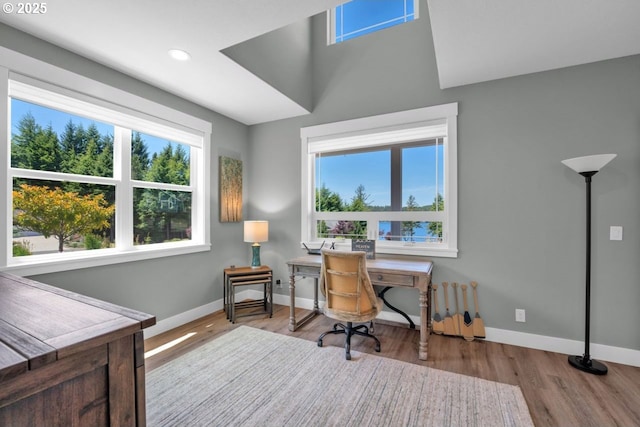 83591 Sauter Dr, Florence, OR 97439 - office with wood finished floors, recessed lighting, and radiator