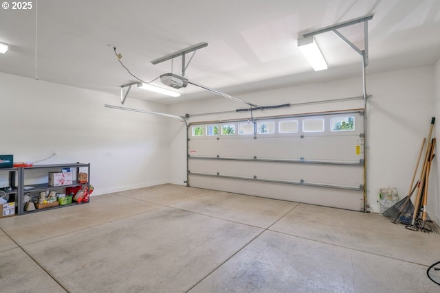 83591 Sauter Dr, Florence, OR 97439 - garage featuring a garage door opener