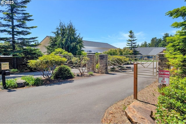 83591 Sauter Dr, Florence, OR 97439 - view of asphalt road with a gate