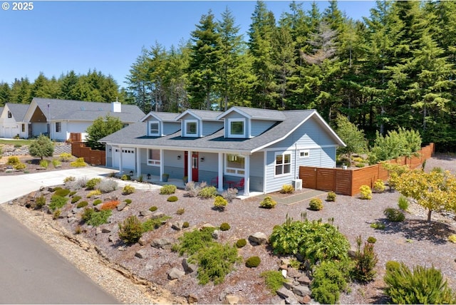 83591 Sauter Dr, Florence, OR 97439 - view of front of property with a porch, driveway, and an attached garage