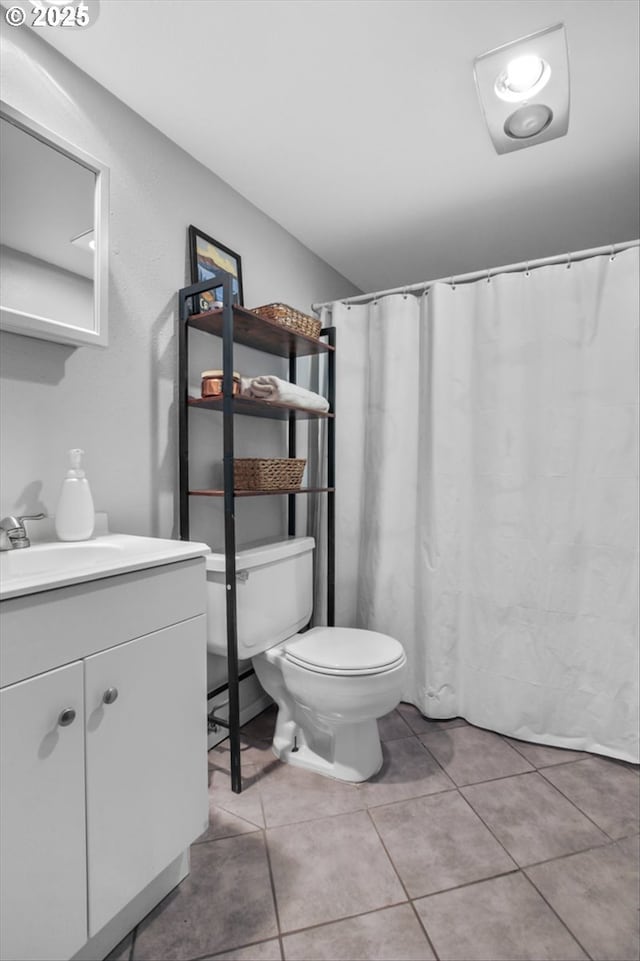9532 SW Whitford Ln, Beaverton, OR 97008 - bathroom with vanity, tile patterned flooring, and toilet