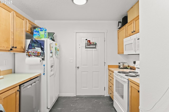 14600 SW Magpie Ln Unit 102, Beaverton, OR 97007 - kitchen featuring white appliances, light countertops, light brown cabinets, and a textured ceiling