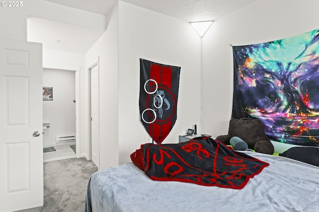 14600 SW Magpie Ln Unit 102, Beaverton, OR 97007 - carpeted bedroom with a baseboard radiator