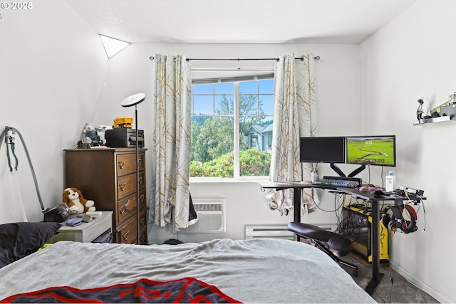 14600 SW Magpie Ln Unit 102, Beaverton, OR 97007 - bedroom featuring a wall mounted air conditioner and baseboards