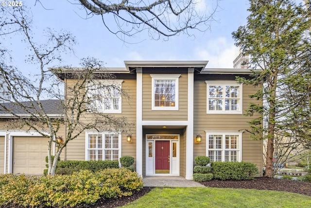 view of front of home with a garage