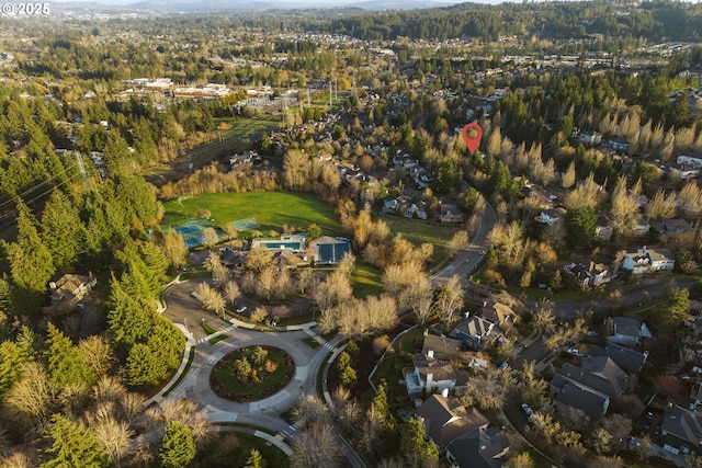 drone / aerial view with a view of trees