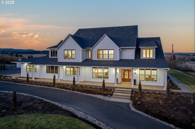 modern farmhouse with a porch