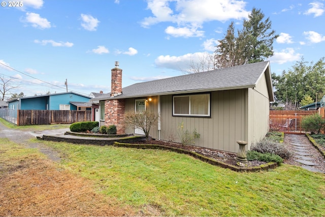 ranch-style home with a front yard