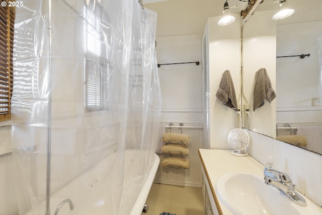 1817 SE 12th Ave, Portland, OR 97214 - full bath with vanity, tile walls, and shower / bath combination with curtain