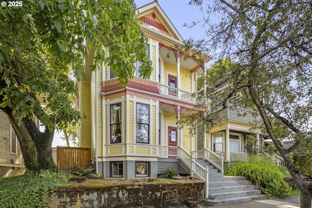 1817 SE 12th Ave, Portland, OR 97214 - victorian-style house with a balcony, a porch, and stairway